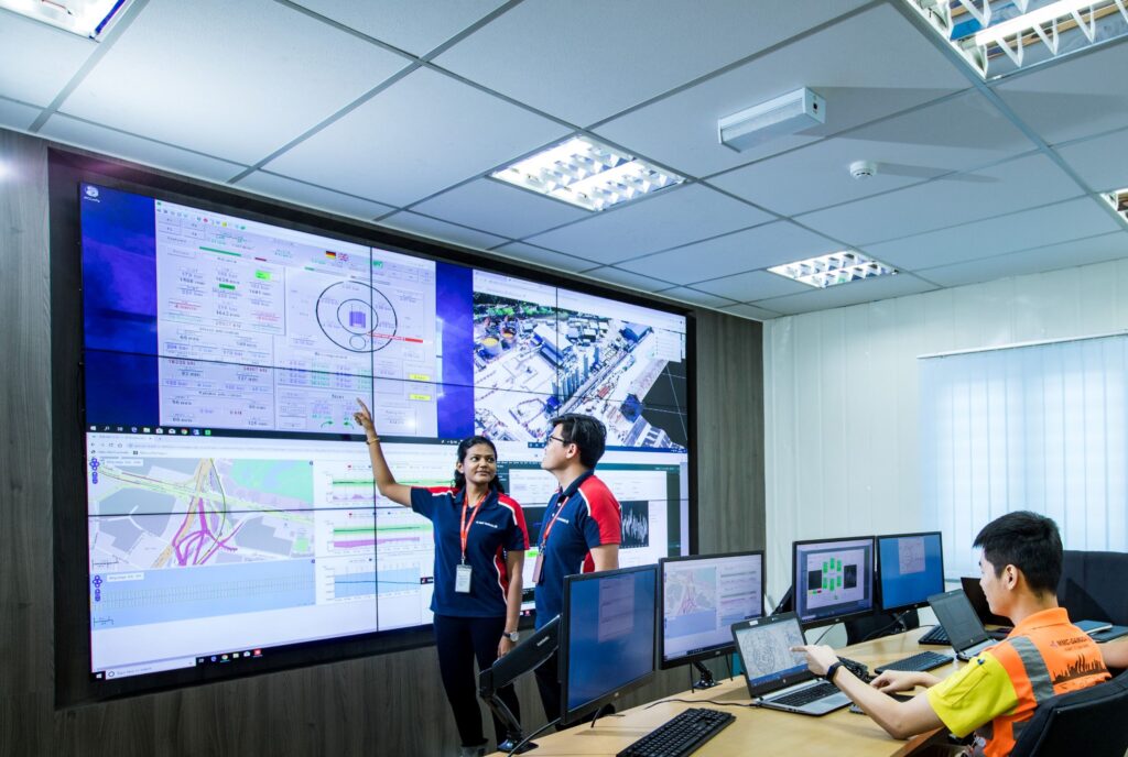 Tunnellers monitoring Tunnel Boring Machines from a control room